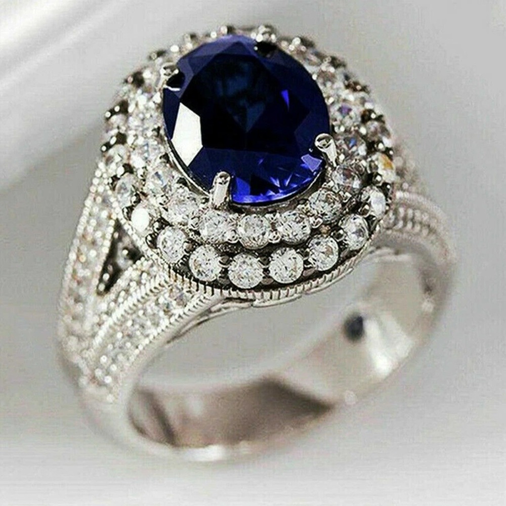 Sapphire Blue and Silver Statement Ring
6.9 grams size 9